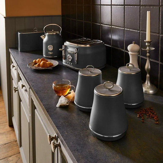 Tower Renaissance matching kettle, toaster, bread bin and canister kitchen set displayed on a modern kitchen worktop.