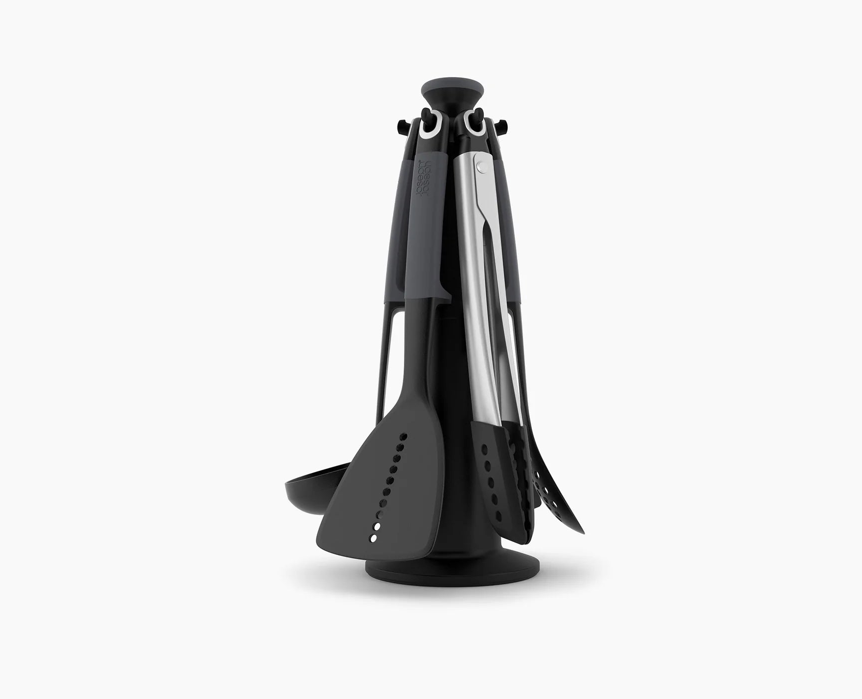 Utensil carousel with six dark gray tools and stainless inserts