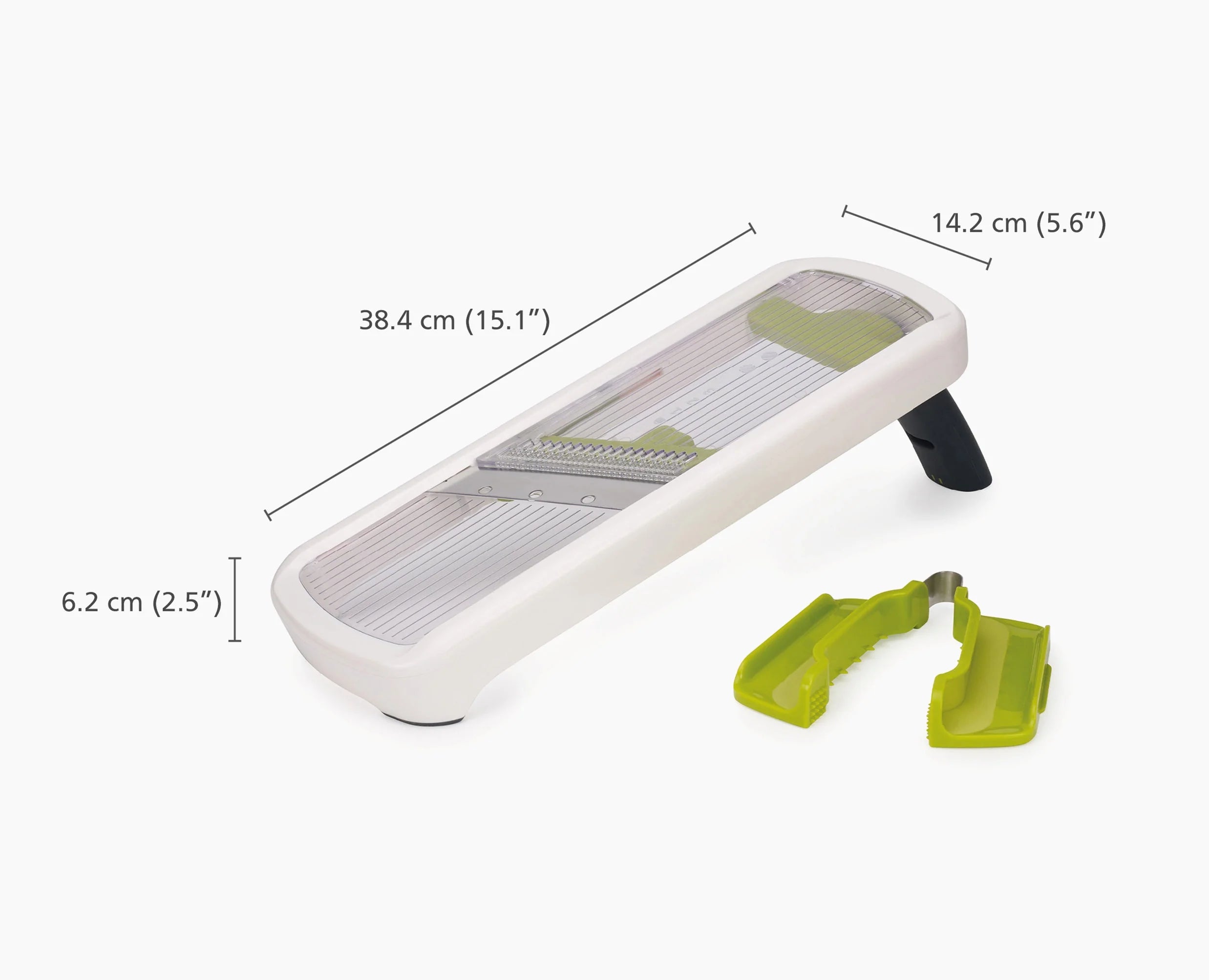 White kitchen mandoline with adjustable blade track and green safety guards