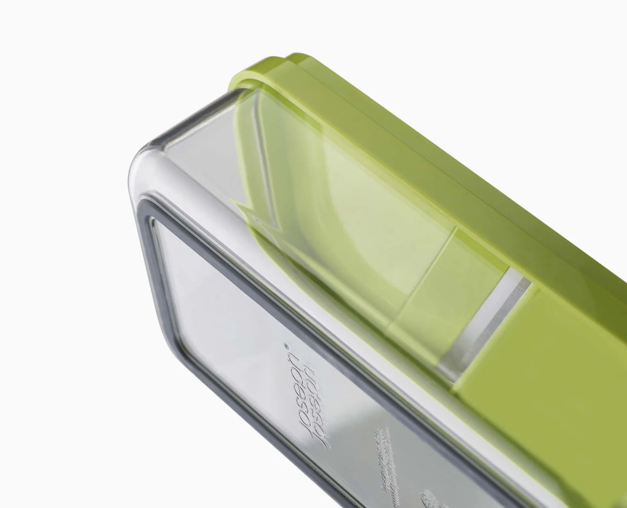 Compact food prep chopper set with translucent green lid and dark base housing