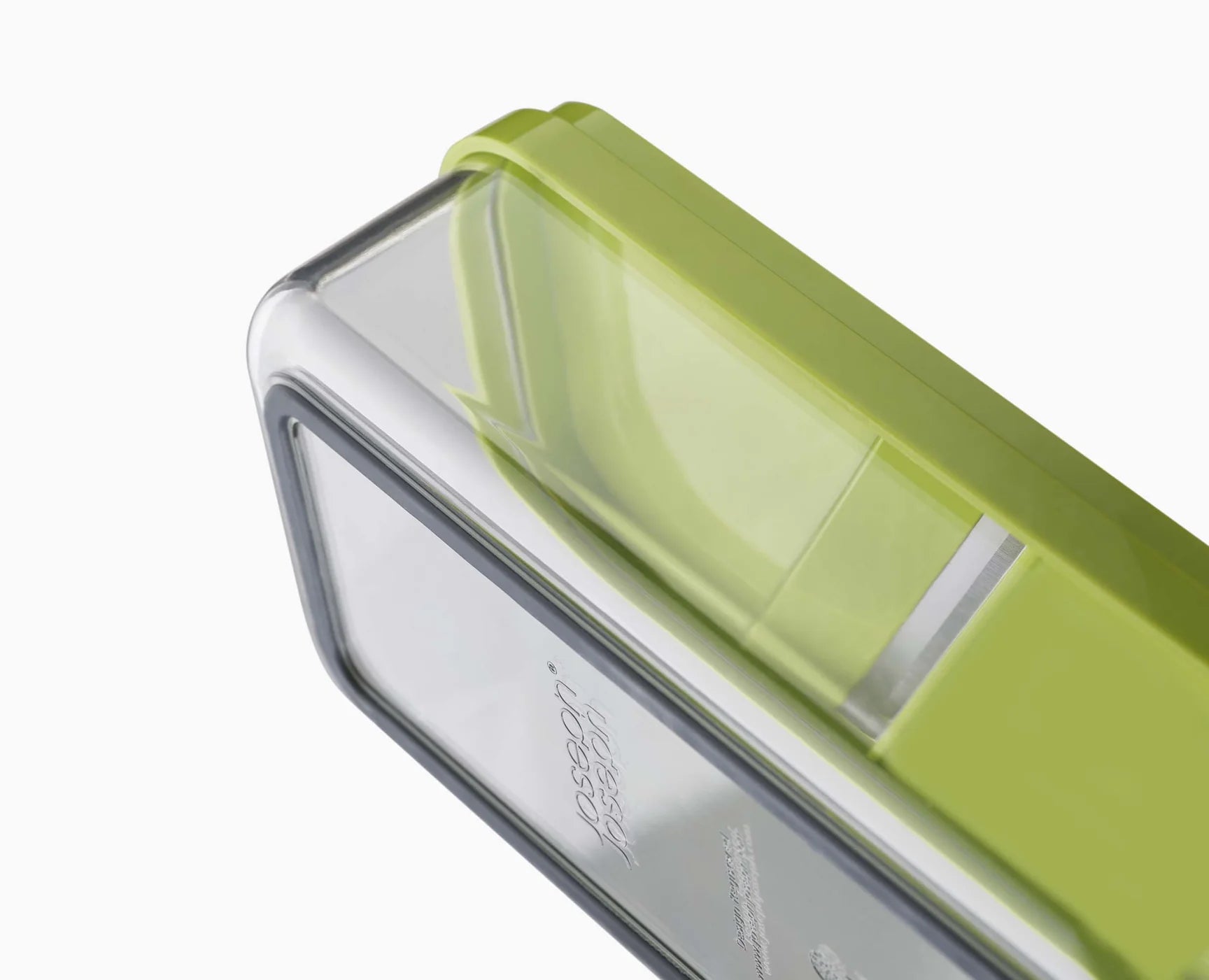 Compact food prep chopper set with translucent green lid and dark base housing