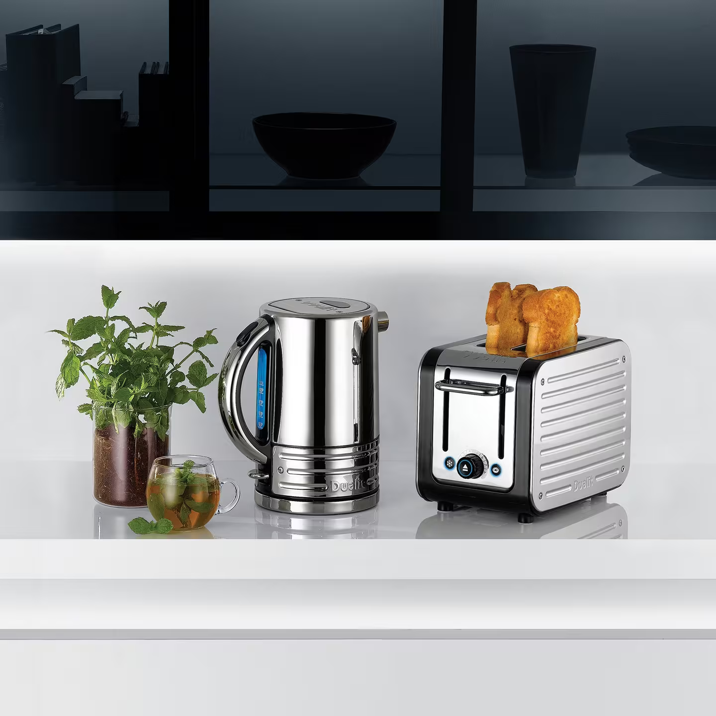 Electric kettle and 2-slice toaster set with stainless bodies and black accents