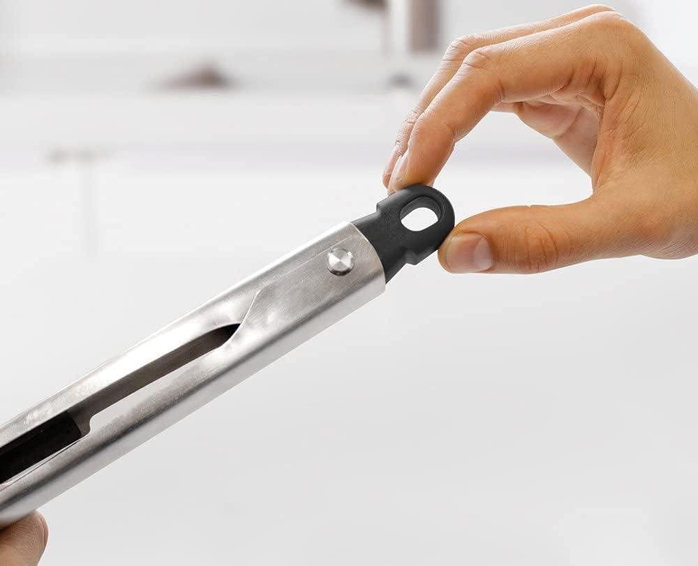Hand-held utensil with gray loop handle and stainless blade