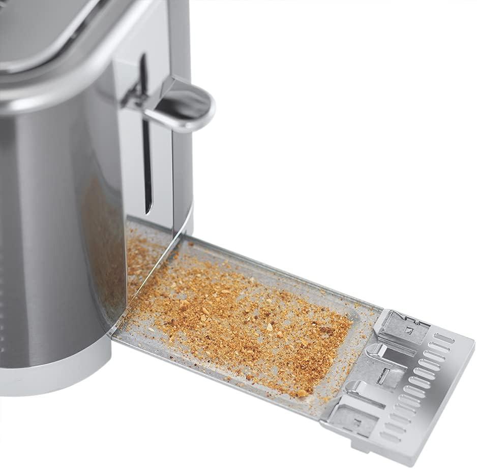 Grey toaster with pull-out crumb tray showing toasted crumbs, Russell Hobbs Geo Steel