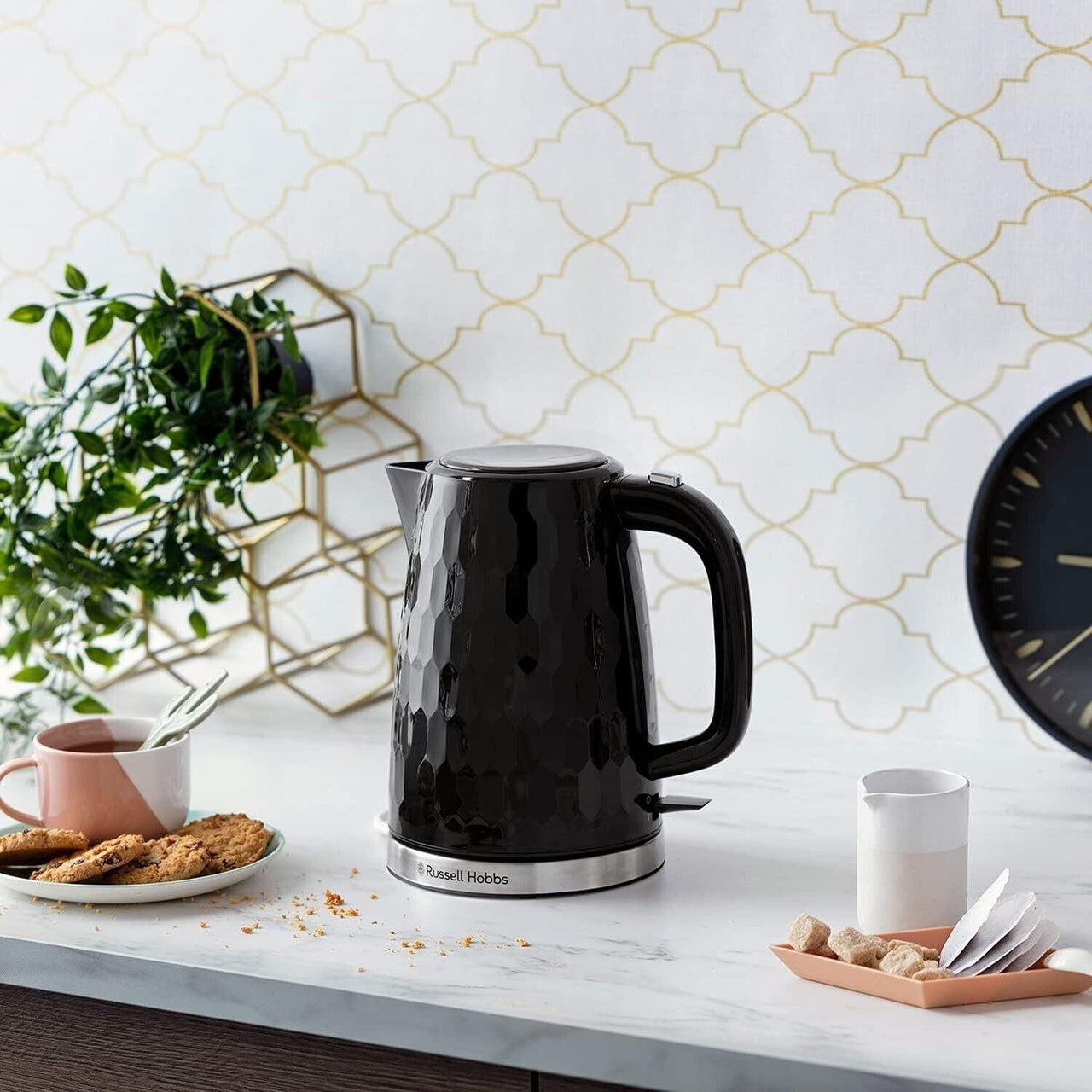 Black electric kettle with honeycomb pattern and blue water level window