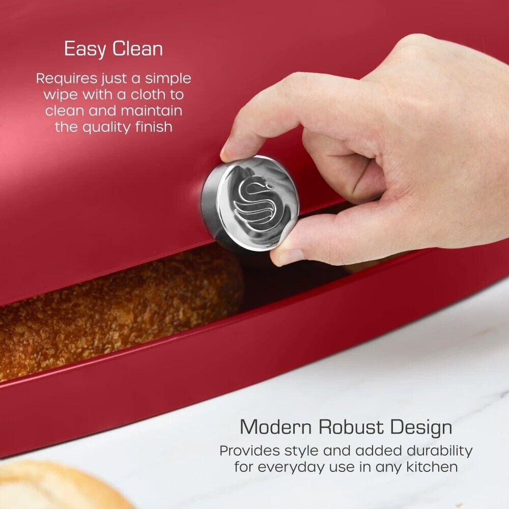 Red bread bin roll-top lid being lifted by hand, chrome knob