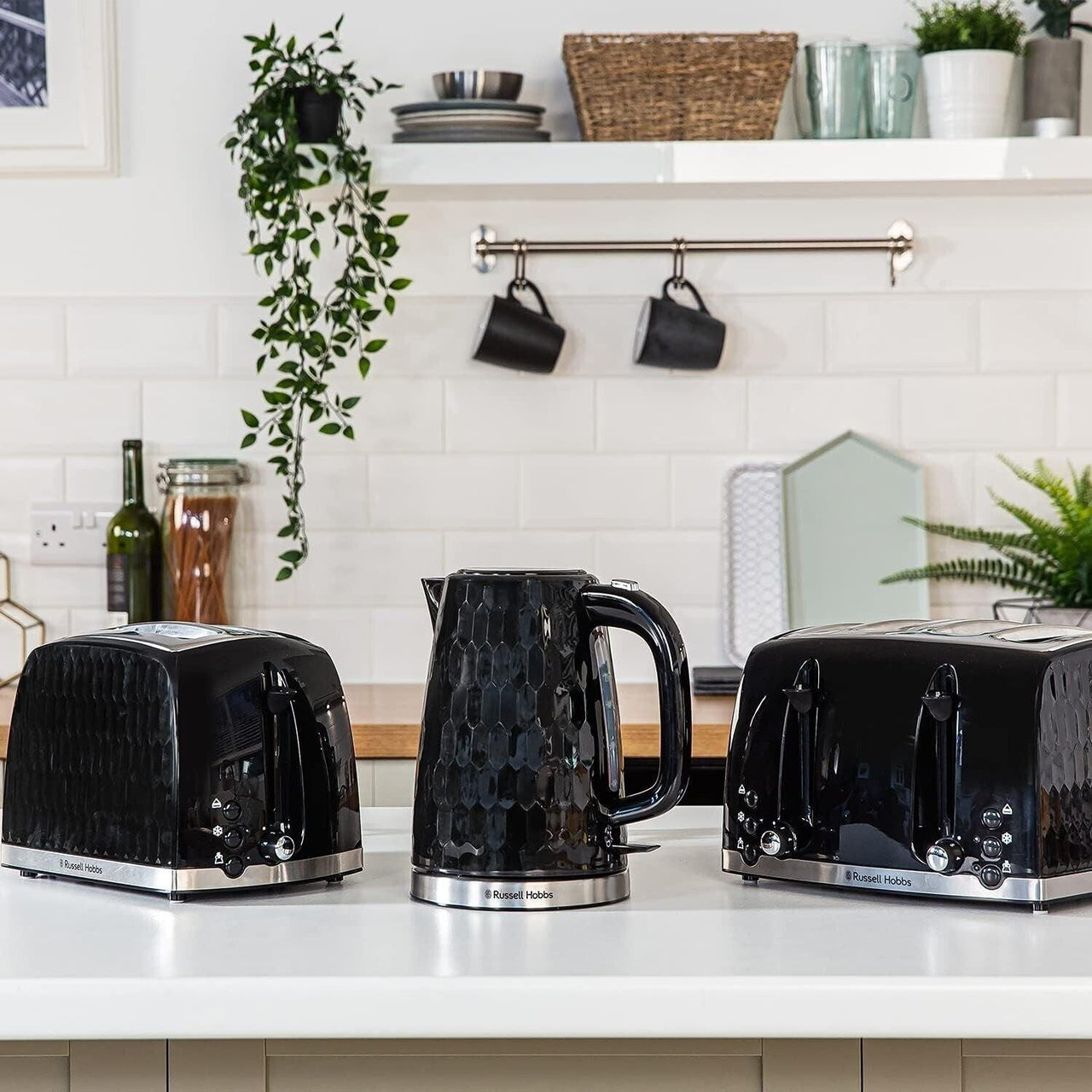 Black honeycomb kettle and 4-slice toaster set on kitchen countertop