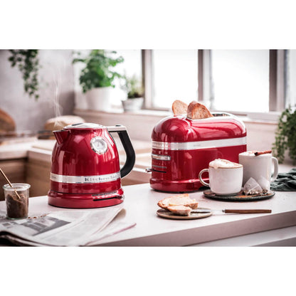 https://cdn.shopify.com/s/files/1/1710/5145/products/5KMT2204BCA-KitchenAid-Artisan-2-Slice-Toaster-Candy-Apple-Lifestyle.jpg?v=1657126220