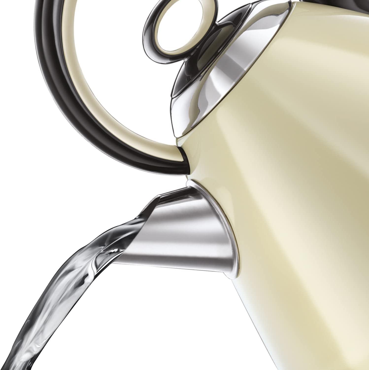Cream kettle with stainless steel spout and curved handle, front view