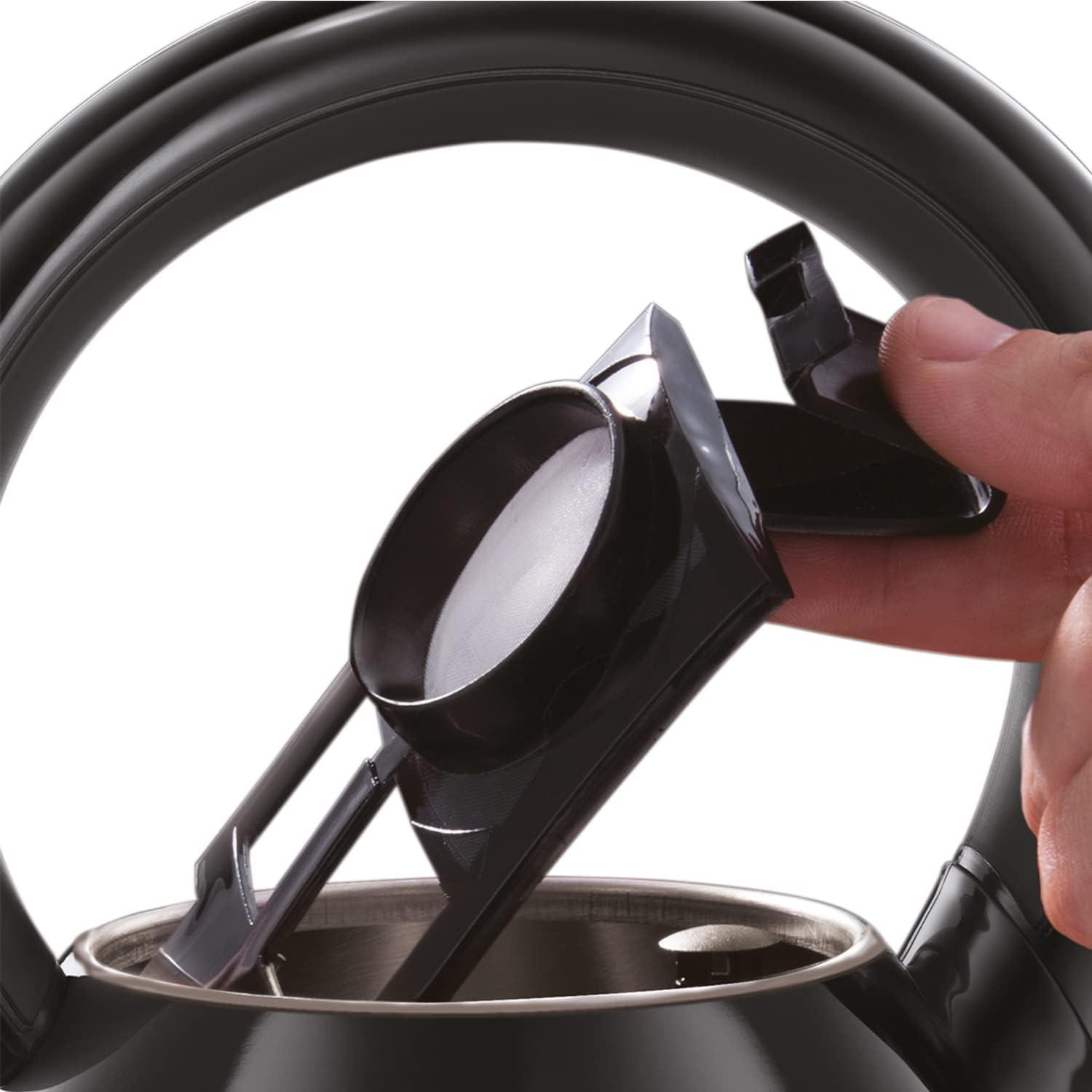 Black electric kettle lid opened, showing internal filter area