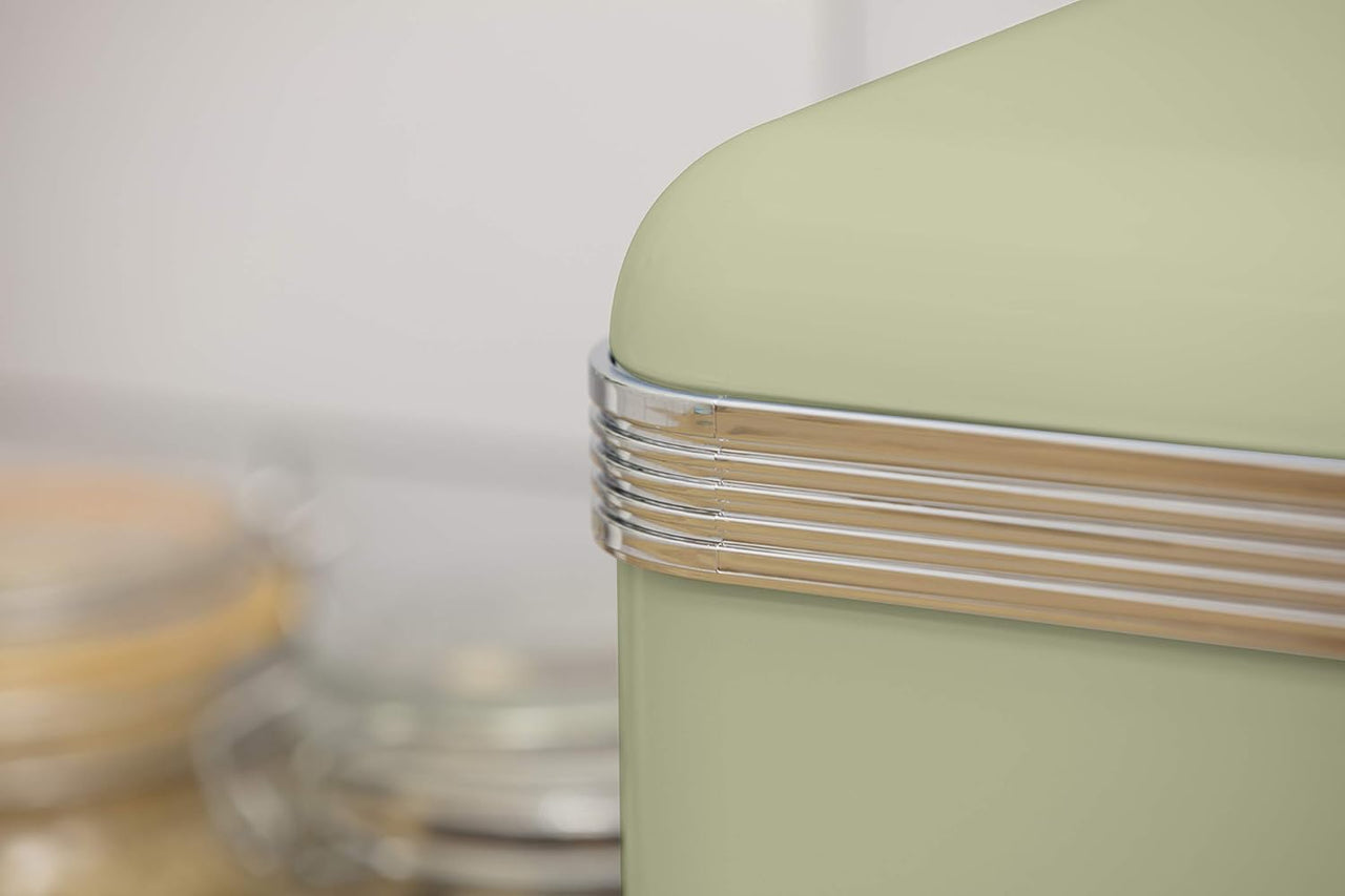 Green bread bin lid edge with silver ridged trim and clear knob