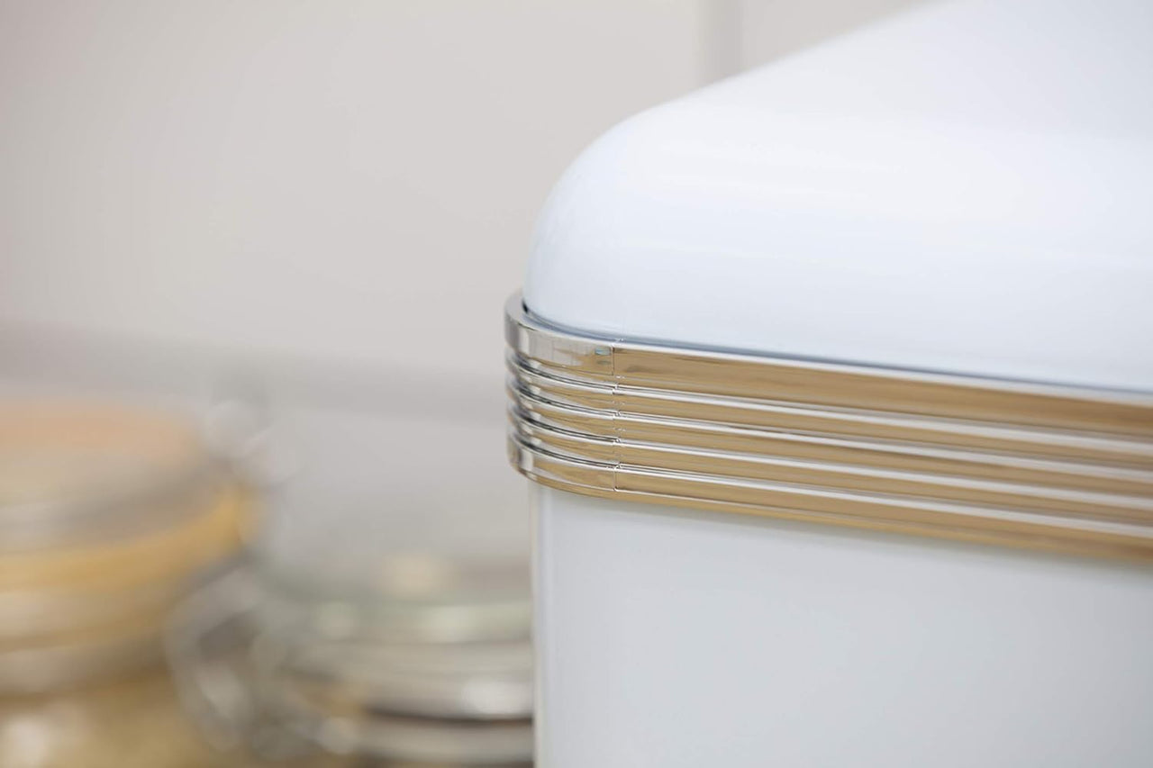Blue bread bin lid edge with chrome ribbed trim and round metal knob