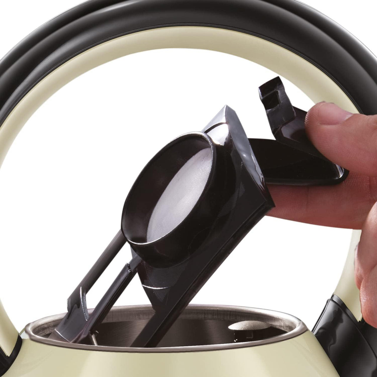 Open cream kettle lid showing inner heating area and black release clip