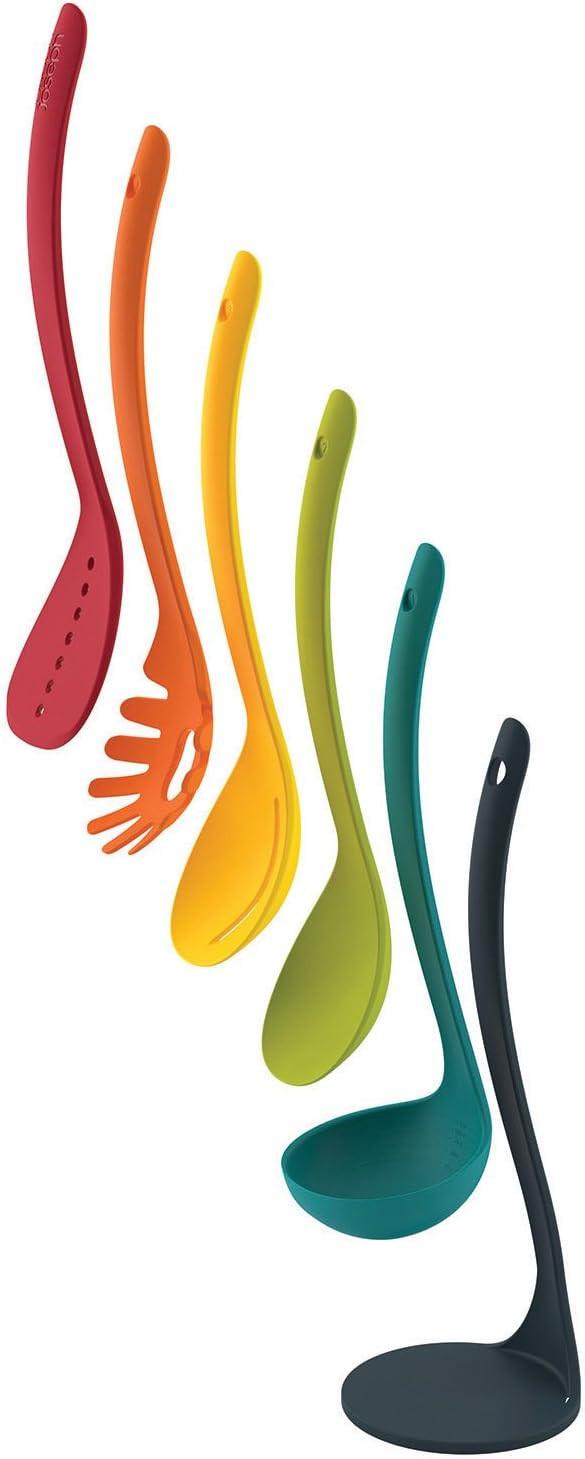 Set of five multicolour cooking utensils with silicone heads on a teal magnetic stand.