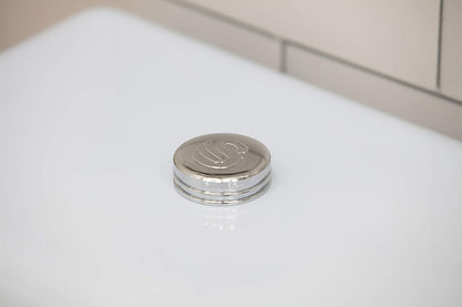 Blue bread bin lid knob with embossed emblem and chrome ribbed trim