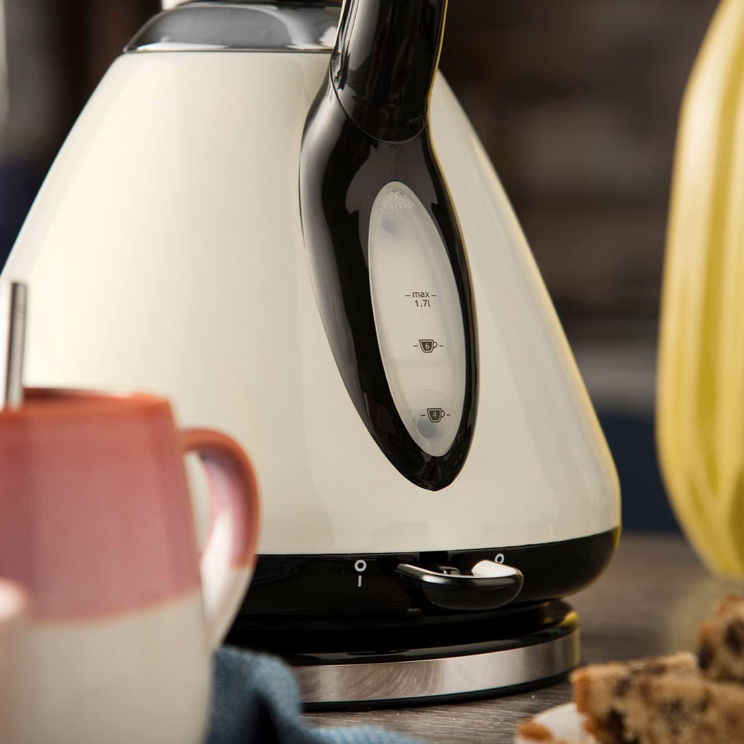 Cream kettle body with black control dial and stainless spout and lid