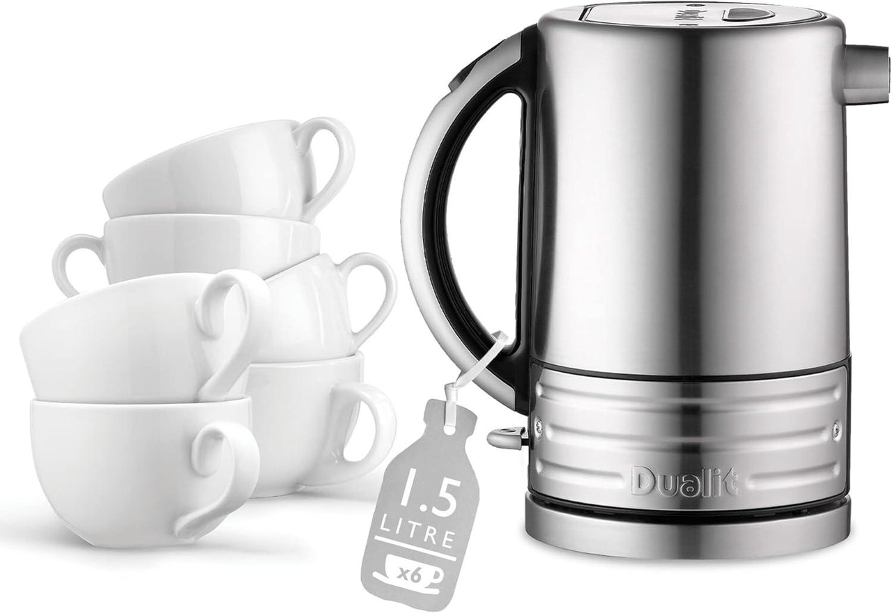 Stainless steel jug kettle with black handle and white cups beside it