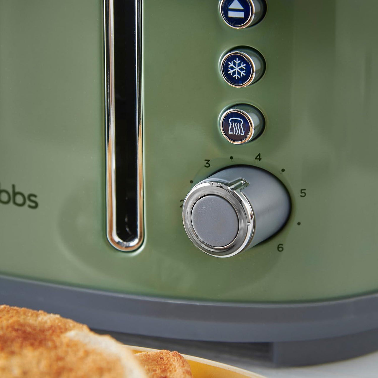Sage toaster control dial with temperature and timer markings and function buttons
