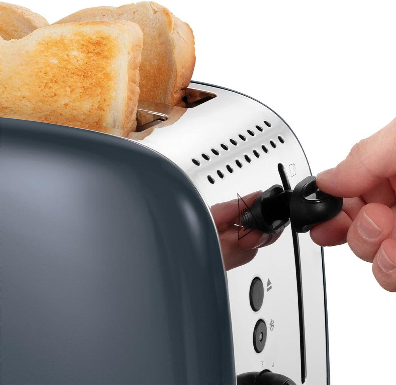 Grey Russell Hobbs toaster showing lever and crumb tray area with bread inside