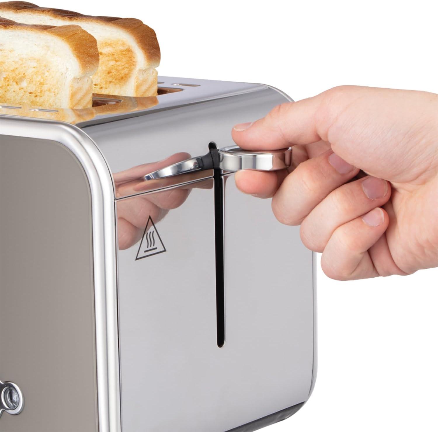 Titanium 2-slice toaster with bread lifted and a hand adjusting the lever