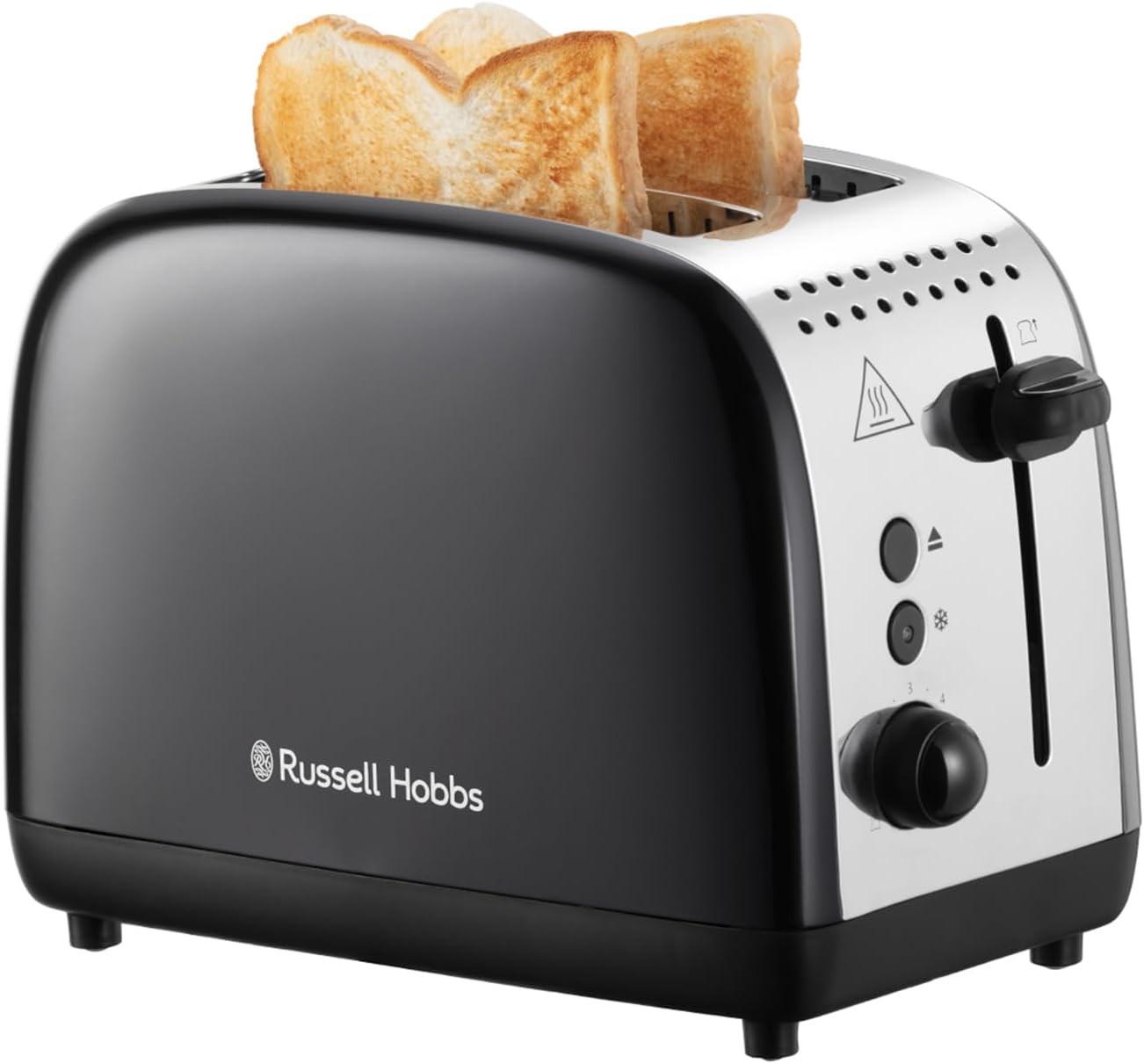 Black 2-slice toaster with bread slices rising inside the slots