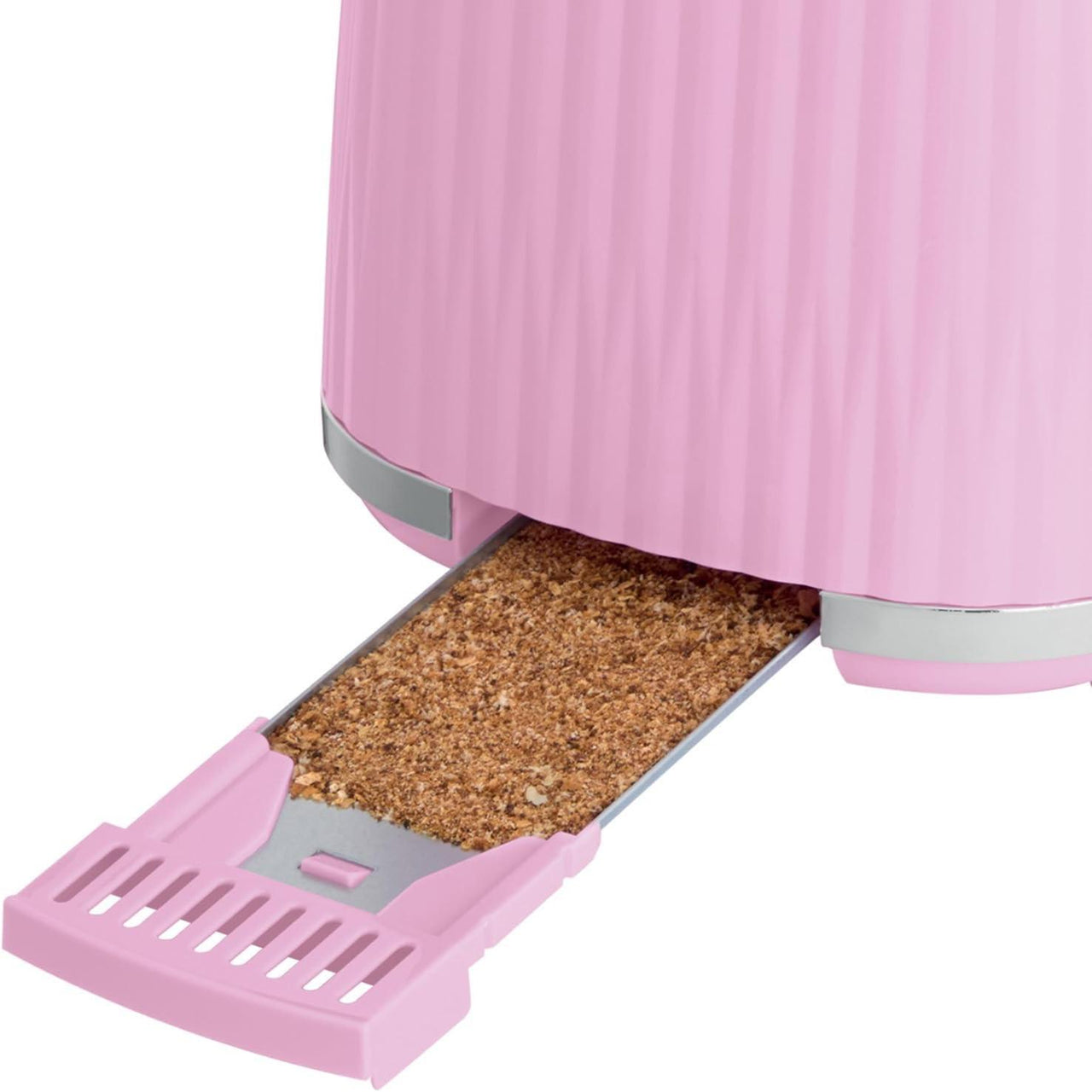 Pink 2-slice toaster with pull-out crumb tray holding toasted crumbs.