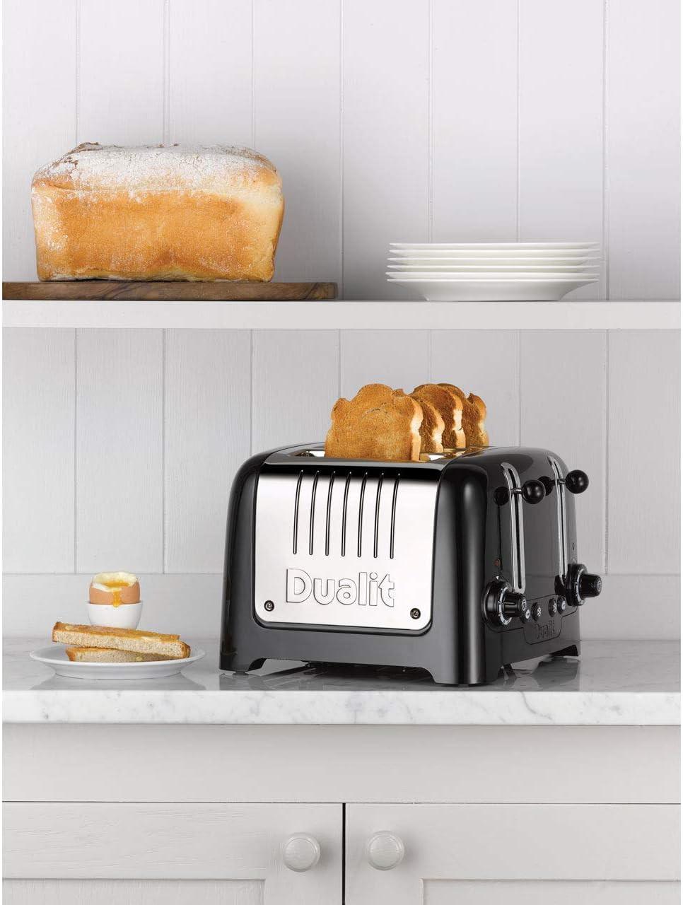Black Dualit Lite 4-slice toaster on countertop with four-slot bread carriage