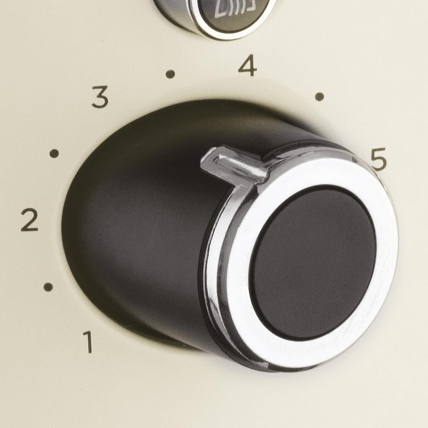 Cream toaster browning dial with numbered settings