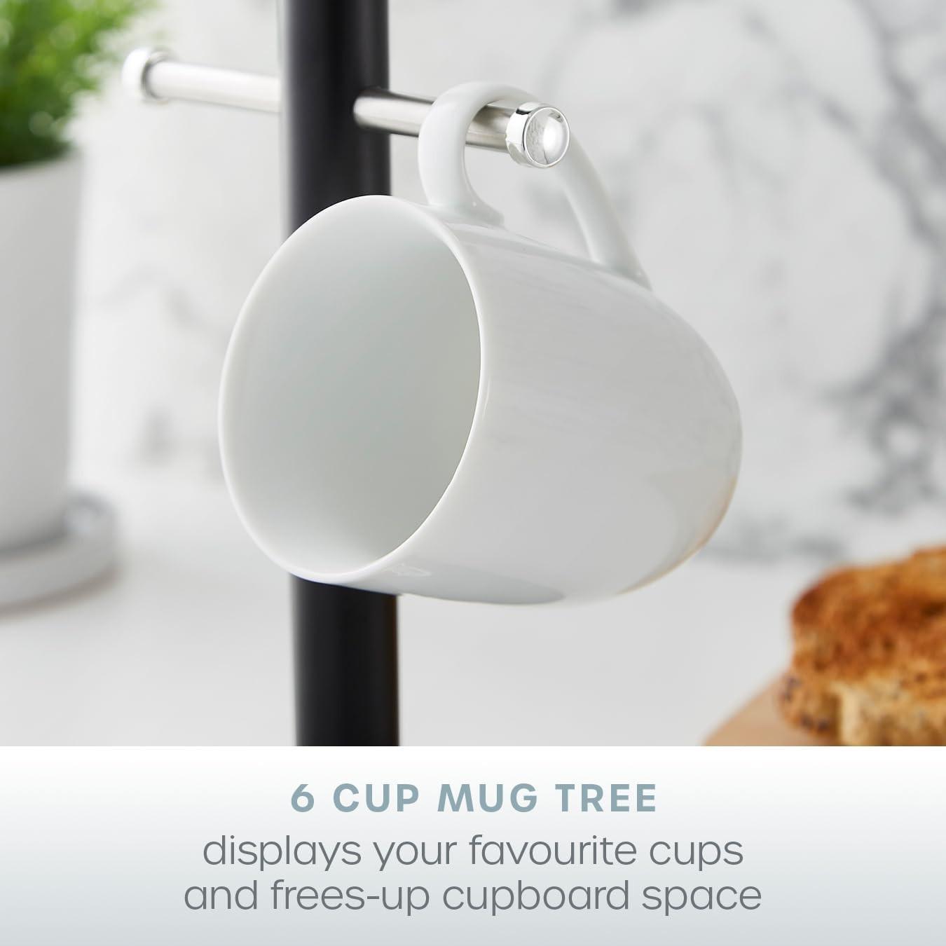 Black mug tree with two white mugs hanging from chrome hooks