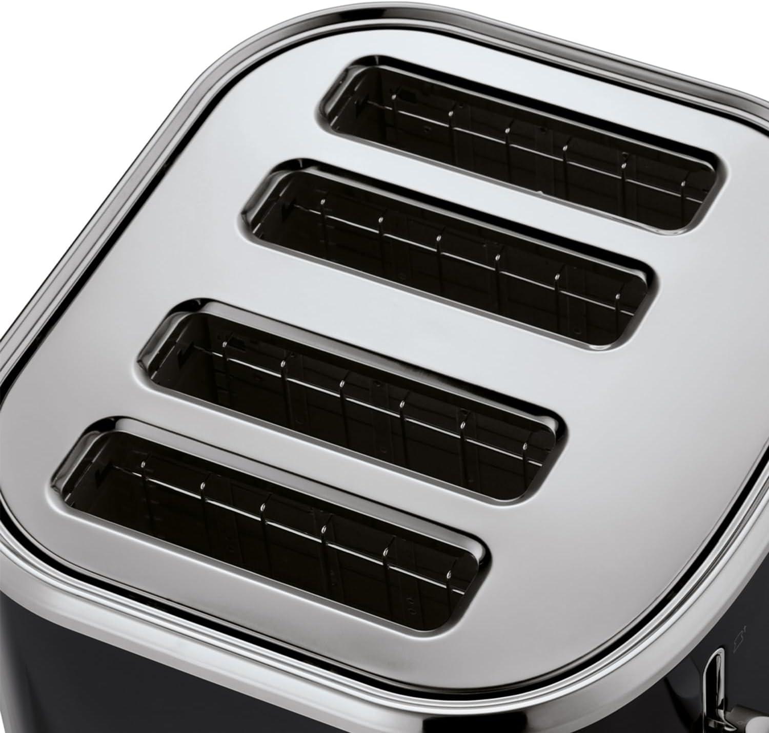 Black 4-slice toaster top view showing four wide slots and brushed metal surround