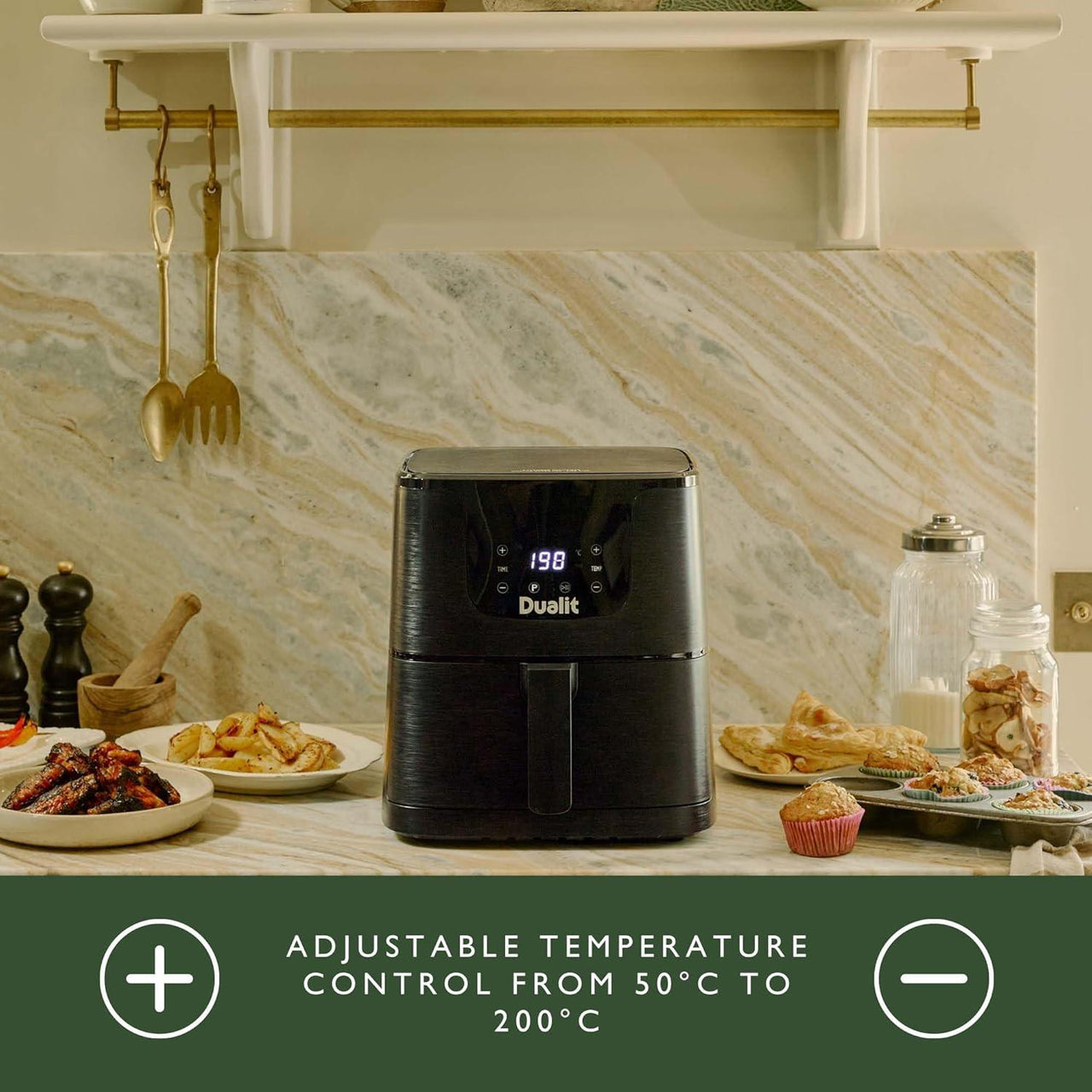 Black Dualit air fryer on kitchen counter with digital display visible.