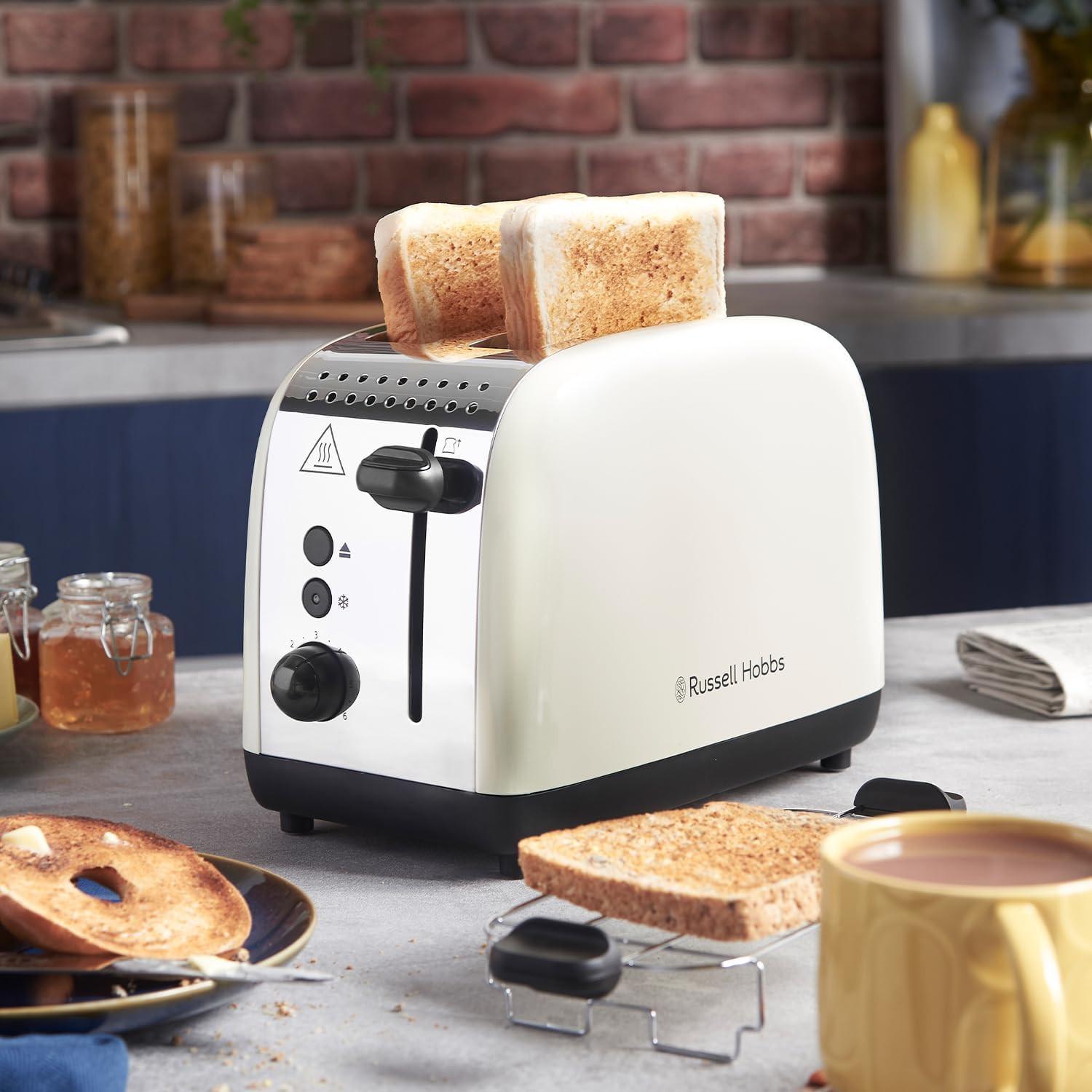 Jasmine cream 2-slice toaster with raised bread and visible black base stand.
