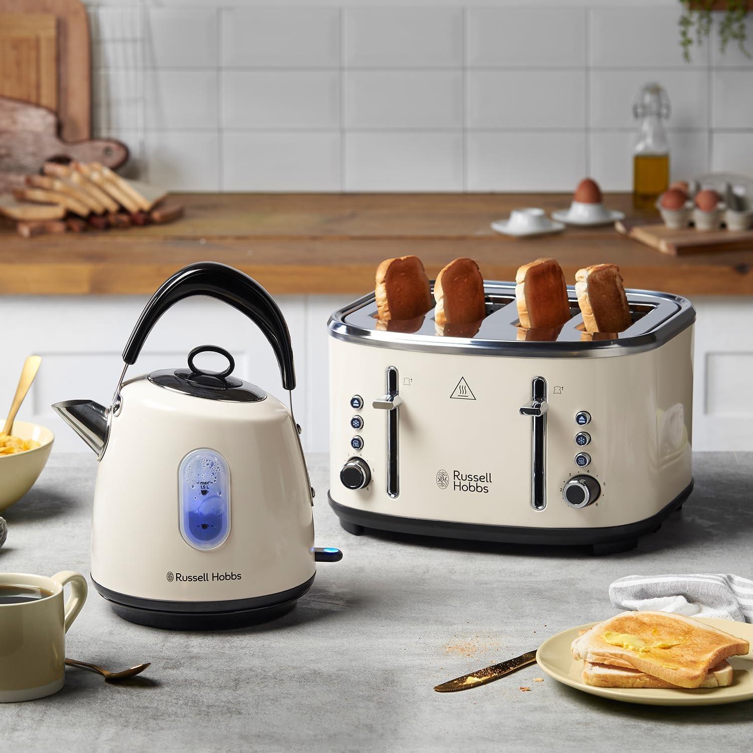 Cream 4-slice toaster on countertop with toast popping up