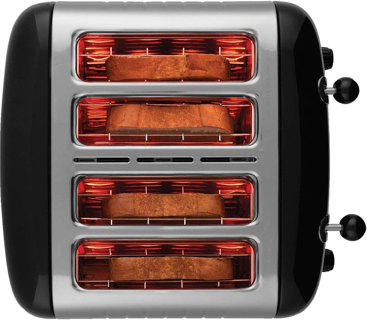 Black Dualit Lite 4-slice toaster showing four glowing toasting chambers
