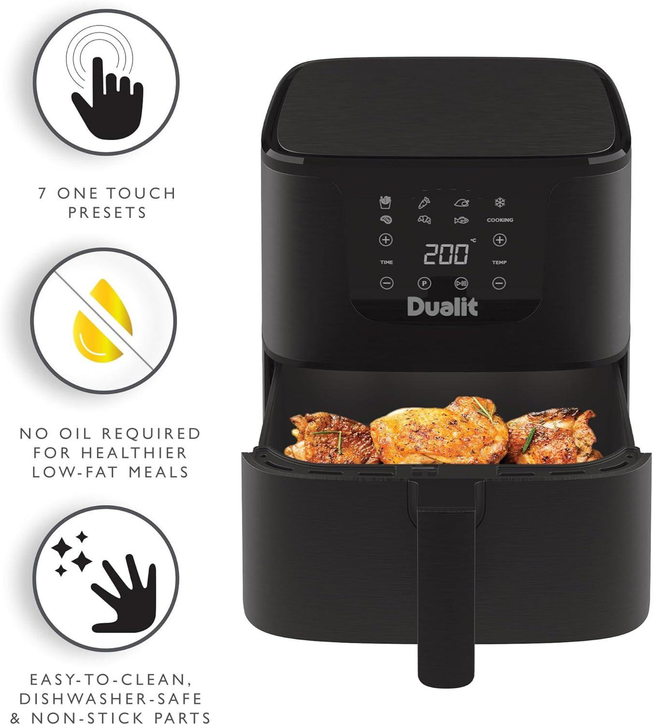 Black Dualit air fryer with cooked chicken visible in open basket.