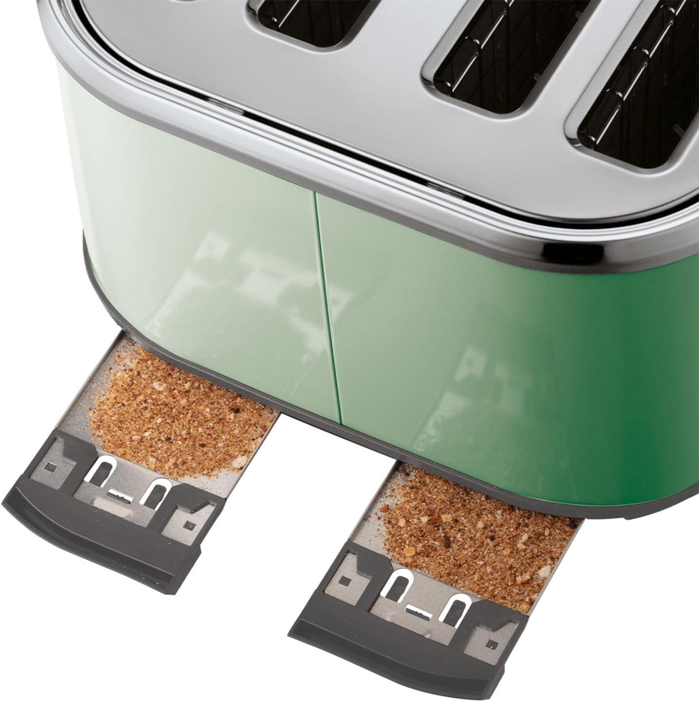 Sage 4-slice toaster with crumb tray pulled out showing toasted crumbs