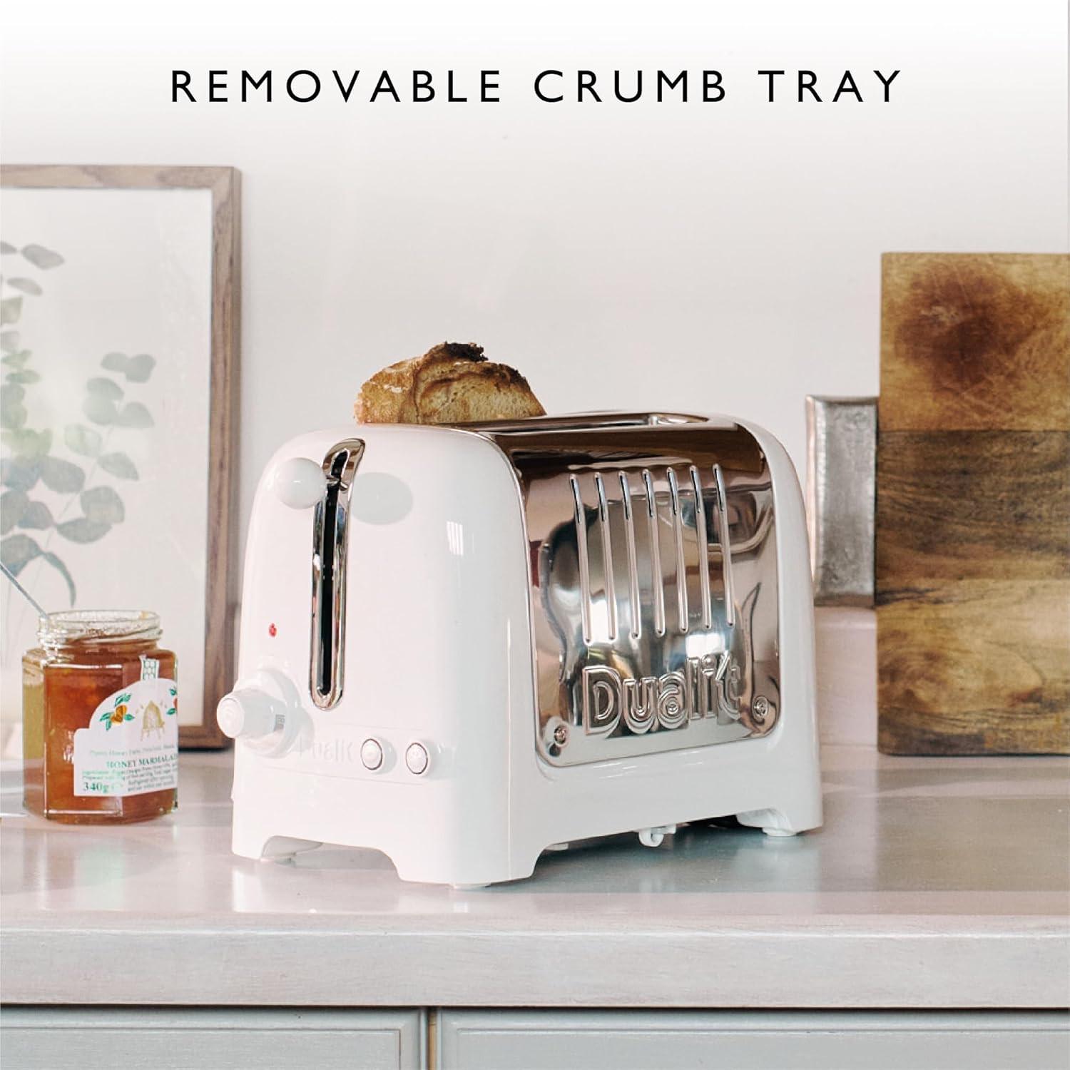 White Dualit toaster with chrome slots and toast slices on top