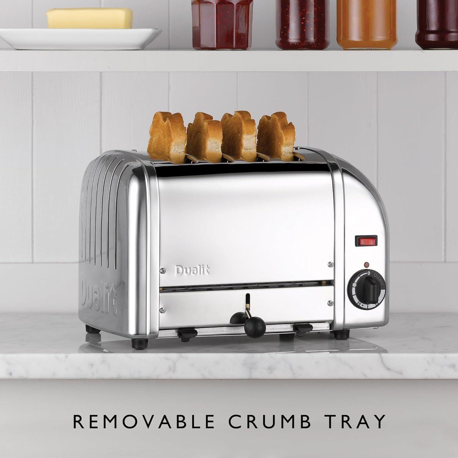 Stainless steel 4-slice toaster showing toasting slots and removable crumb tray front