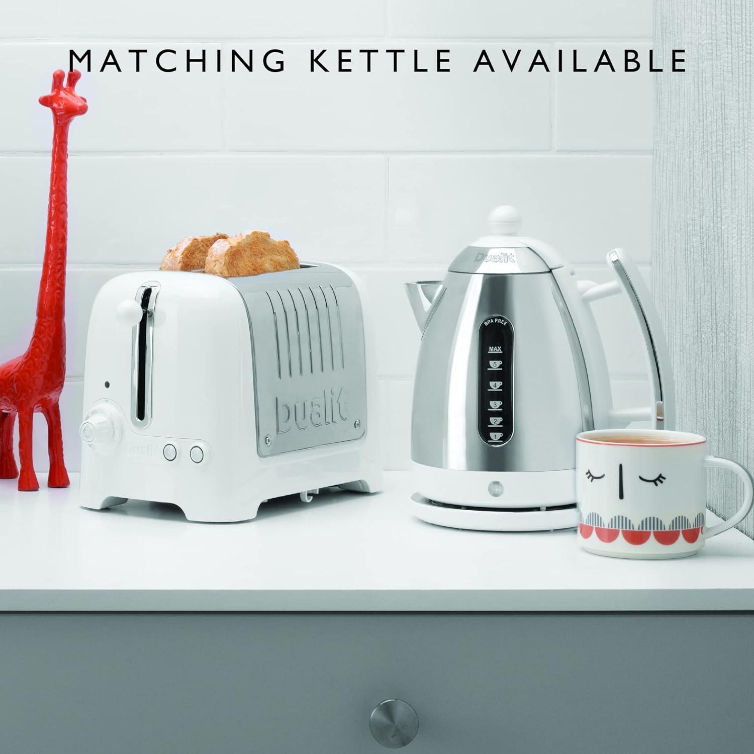White Dualit Lite toaster with lever and wide slots, on countertop