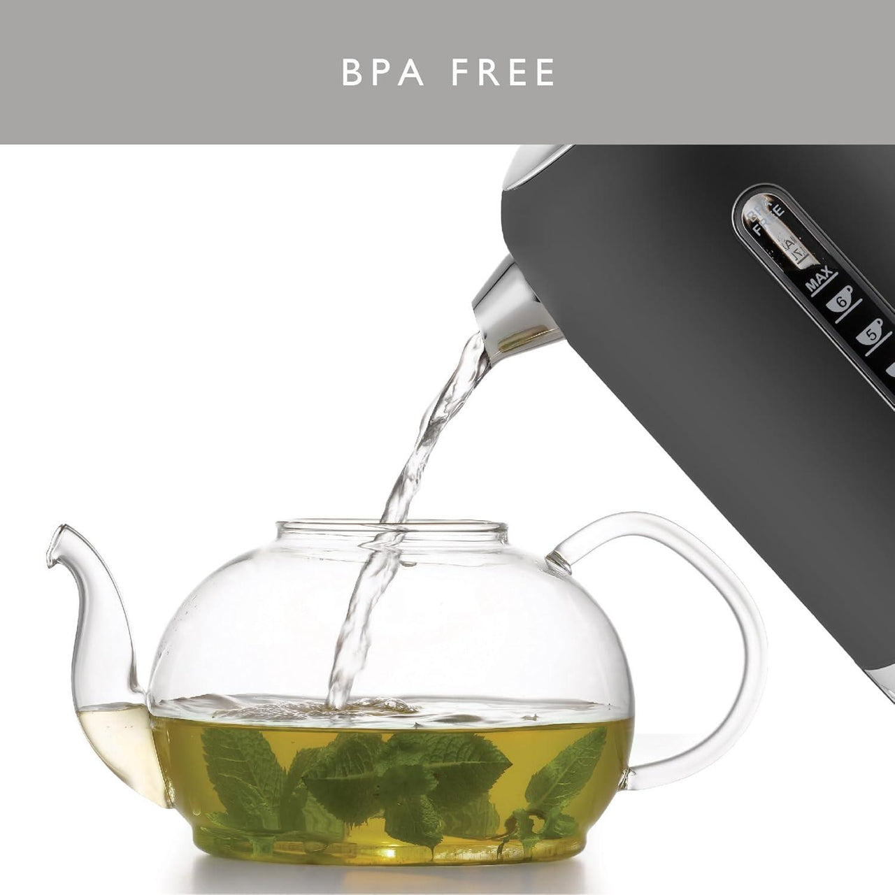 Matte black electric kettle pouring clear water into a glass spout cup