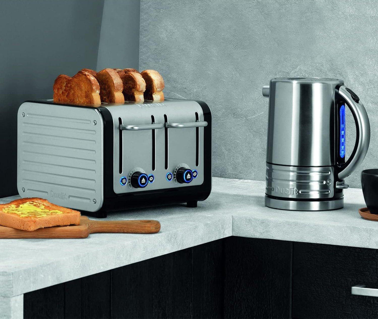Stainless steel 4-slice toaster with black base; bread slices shown in raised slots