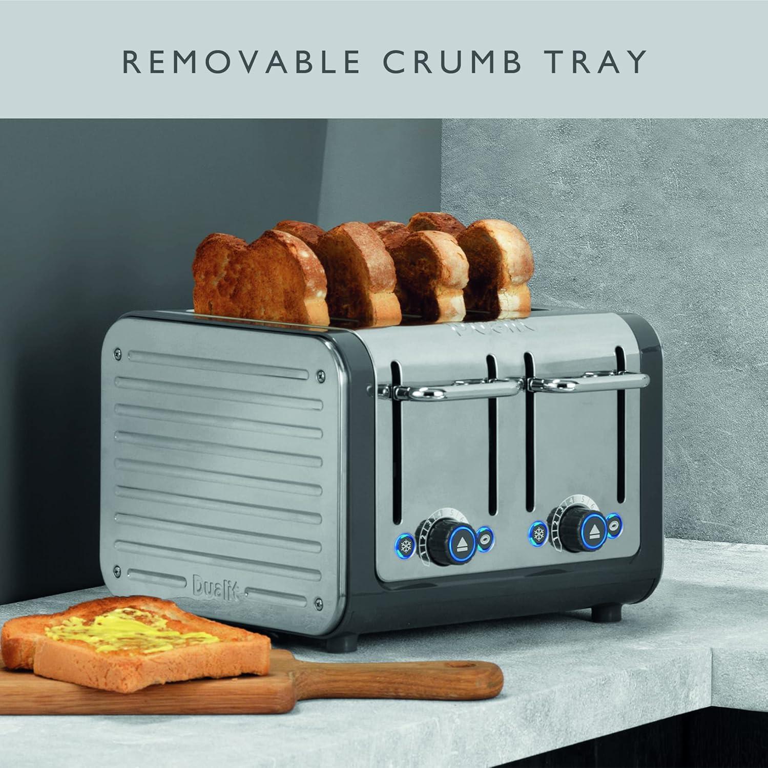 Grey Dualit 4-slice toaster showing removable crumb tray under the front panel
