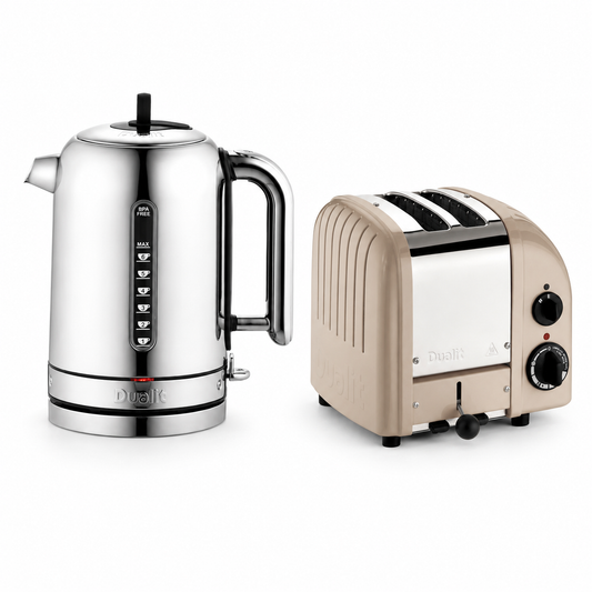 A stainless steel electric kettle and a beige-toothed toaster with a silver front panel, shown side by side on a white background. The brand name 'Duck' is visible on both appliances.