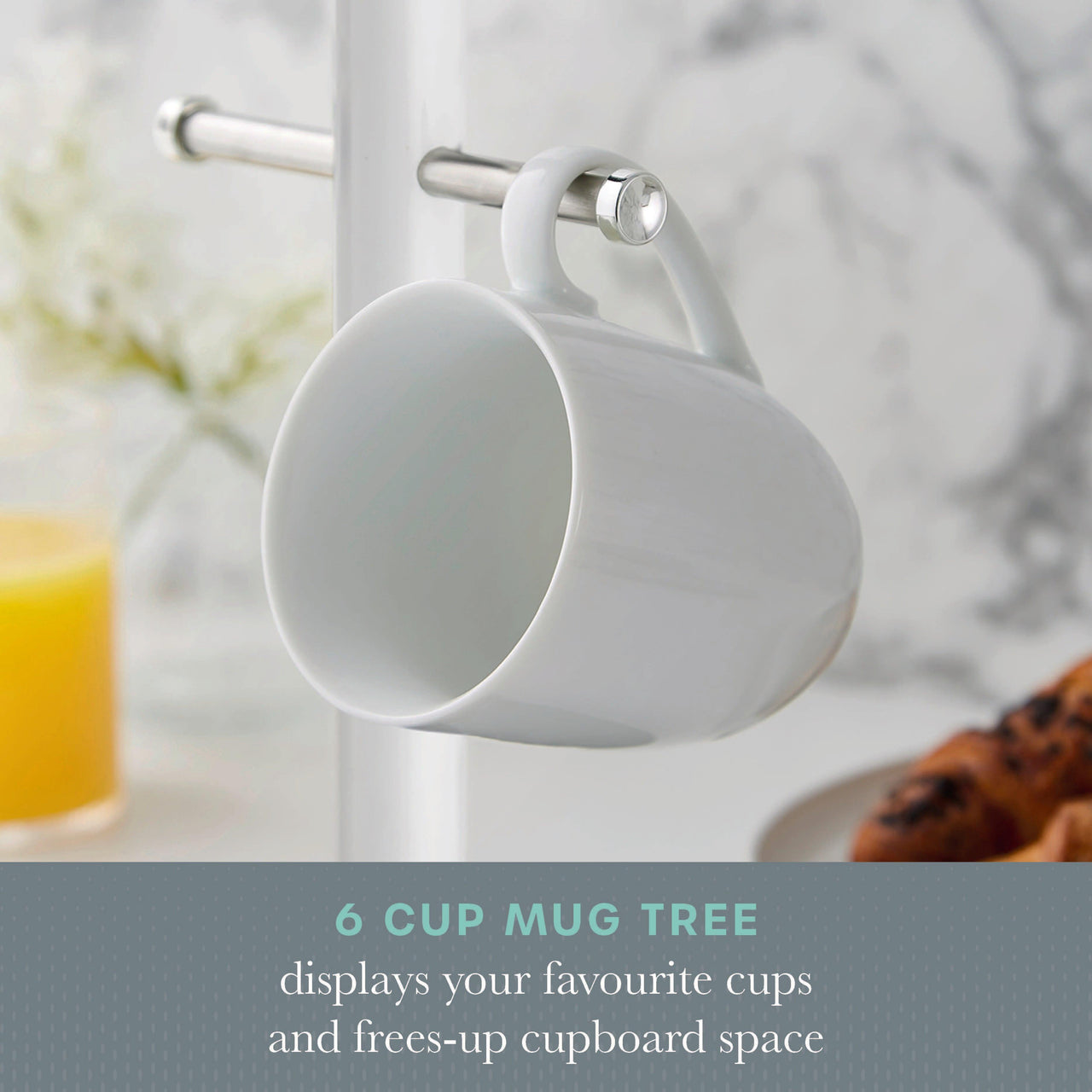 White mug tree pole with stacked cups on horizontal hooks