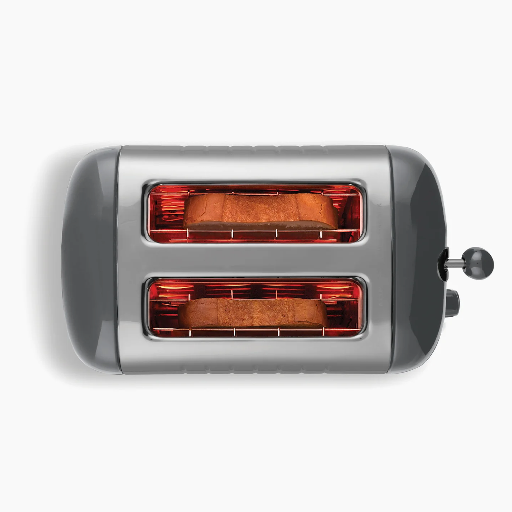 Grey 2-slice toaster with both slots glowing red during toasting