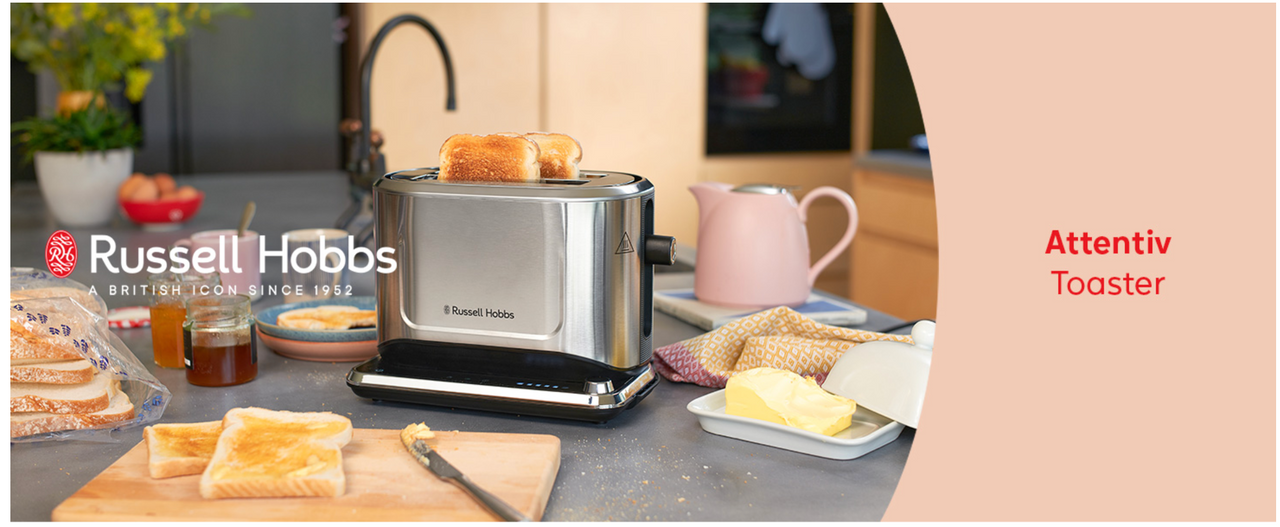 Stainless steel 2-slice toaster on countertop with toast popping up