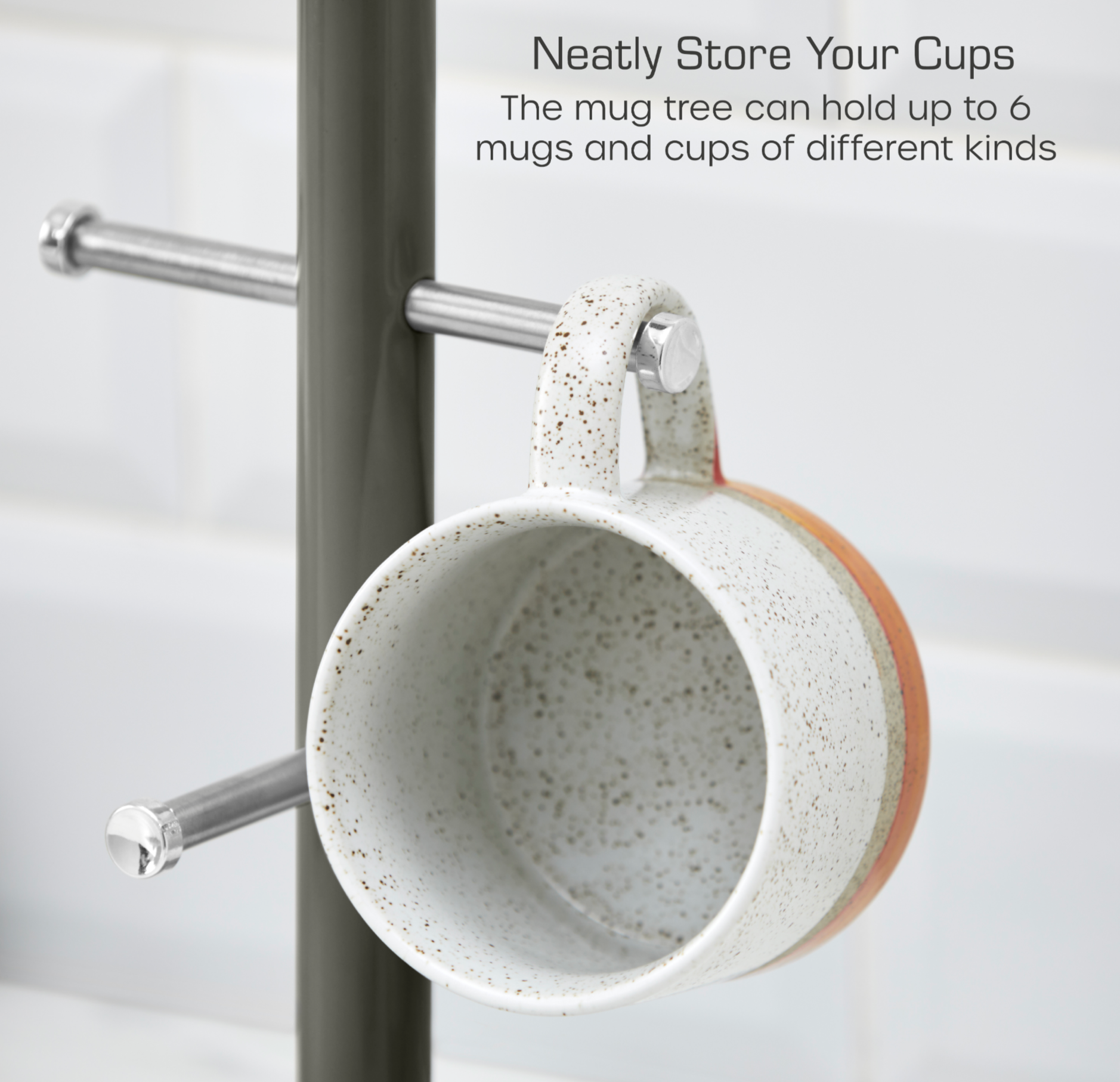 Graphite mug tree with chrome hooks holding a speckled mug