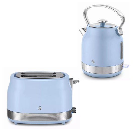 A light blue retro-style electric kettle and matching two-slot toaster shown on a clean white background. Both appliances feature a glossy pastel blue finish with brushed silver metallic accents on the bases, handles, and toaster slots.