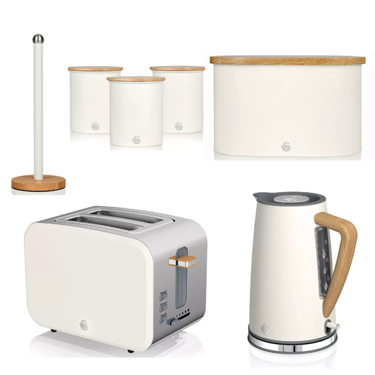 White countertop toaster and electric kettle with matching bread bin canisters and towel pole