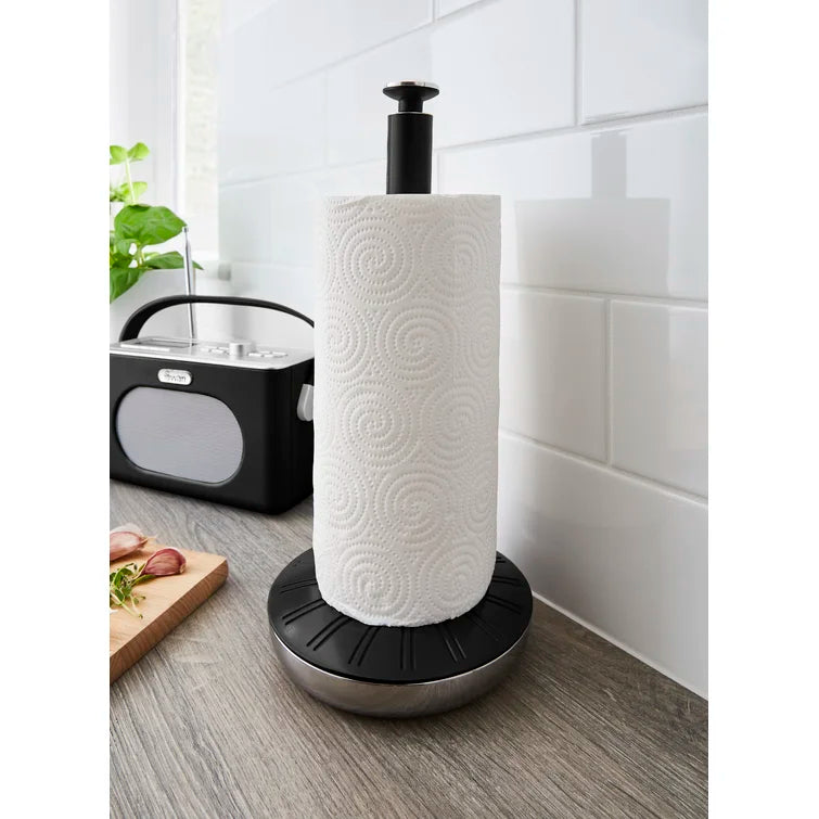 Black metal mug tree with paper towel roll on round base